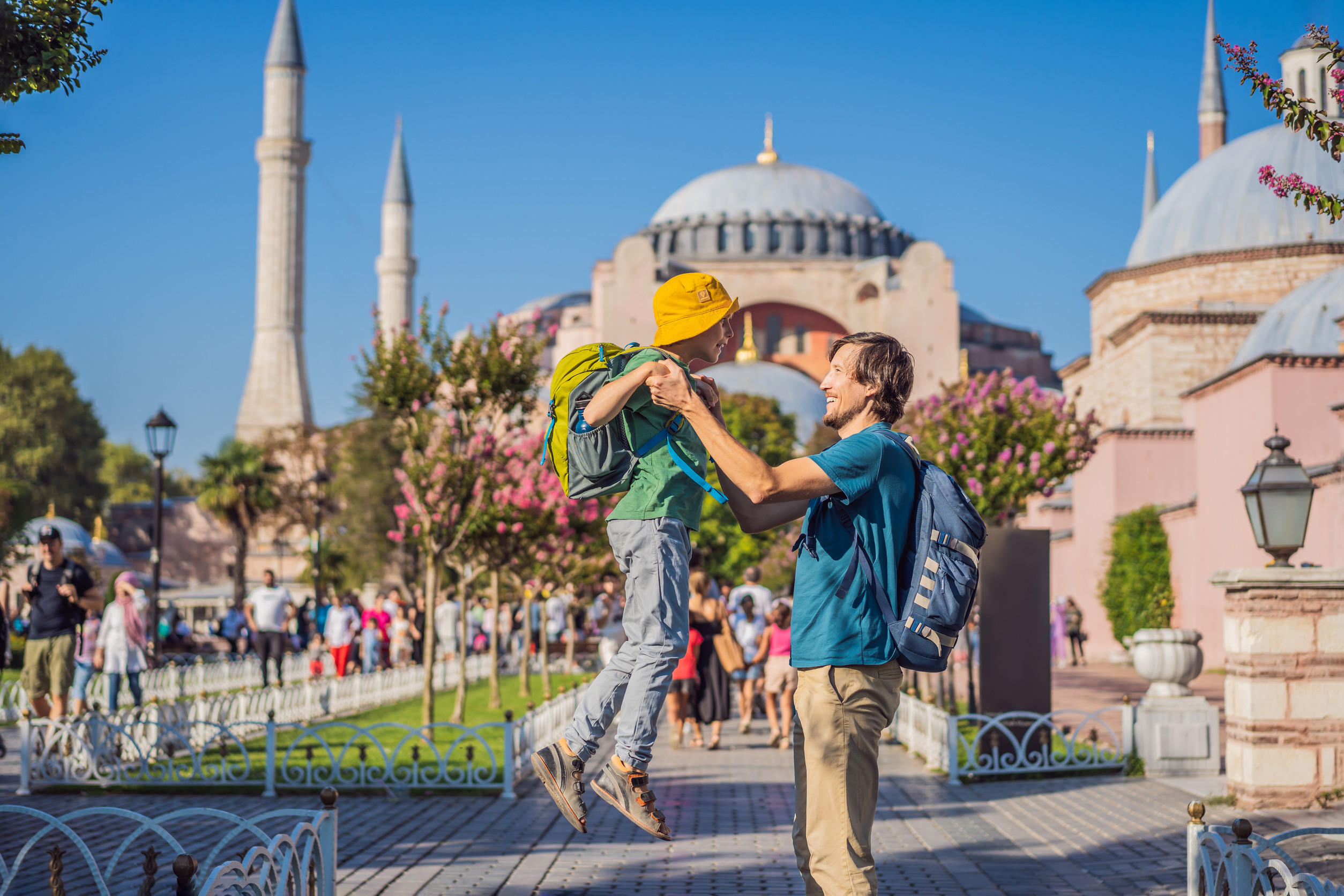 father and son tourists enjoy beautiful view on hagia sophia cathedral famous islamic father and son tourists enjoy beautiful view on hagia sophia cathedral famous islamic