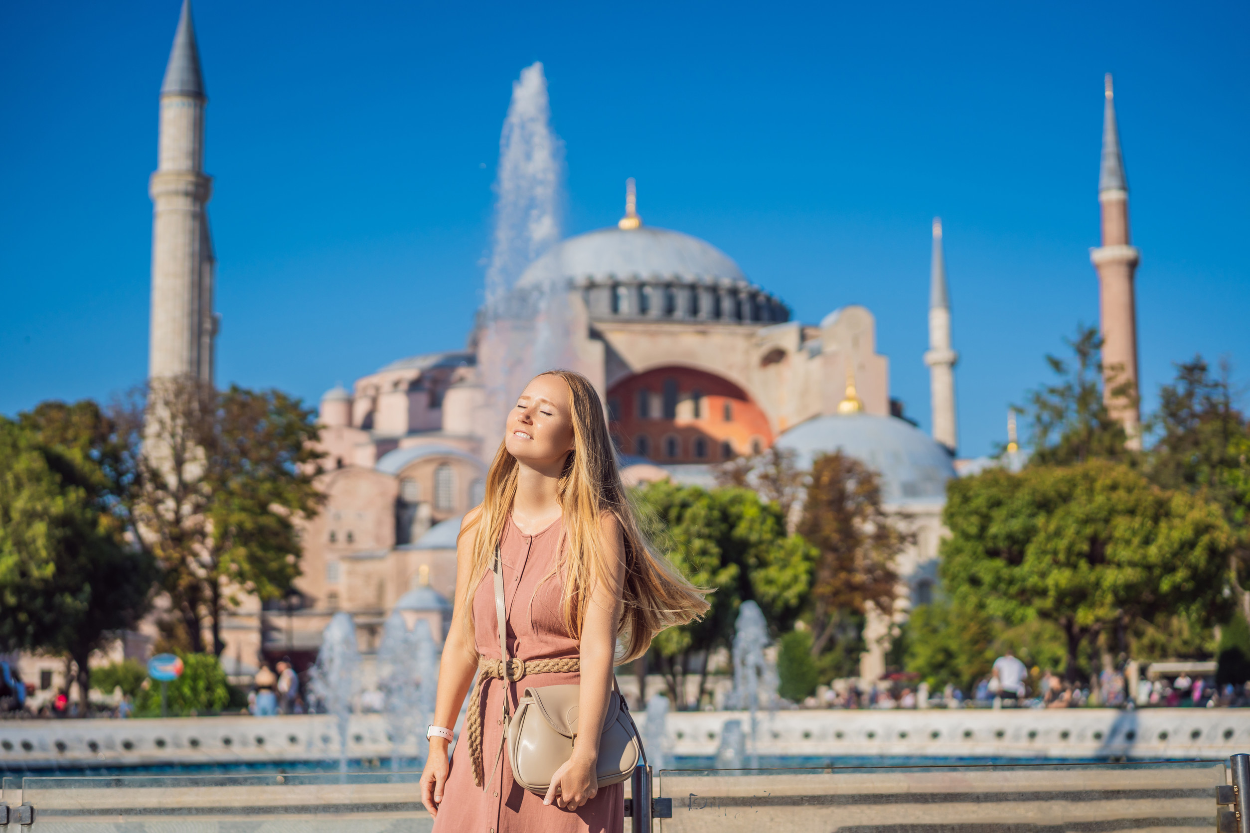 woman enjoy beautiful view on hagia sophia cathedral famous islamic landmark mosque travel woman enjoy beautiful view on hagia sophia cathedral famous islamic landmark mosque travel